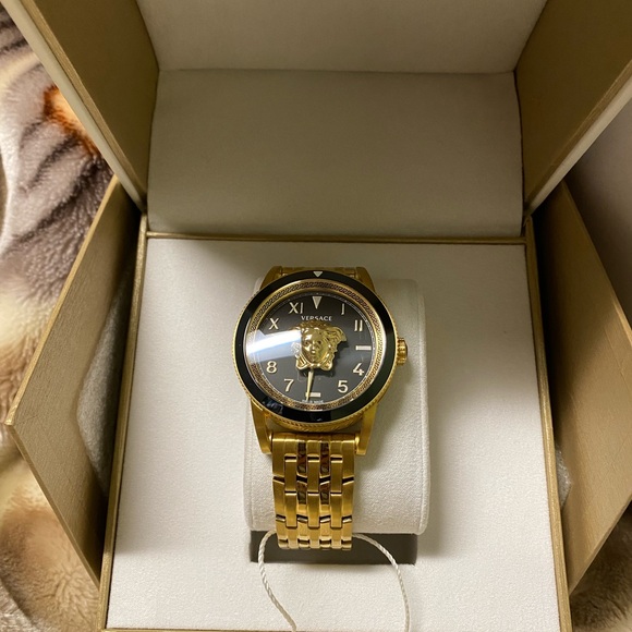 Versace Gold and Black Watch with Round Face and Metal Band